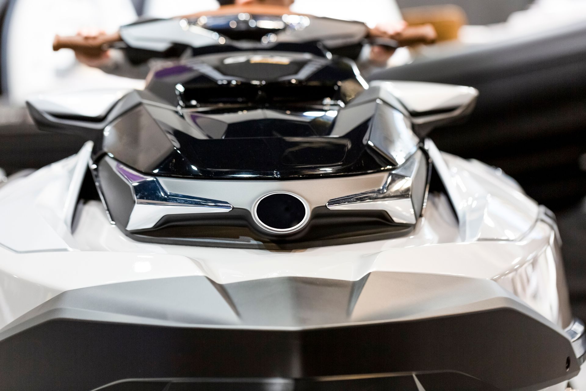 Close-up front view of a modern, silver and black jet ski, from a jet ski dealer.