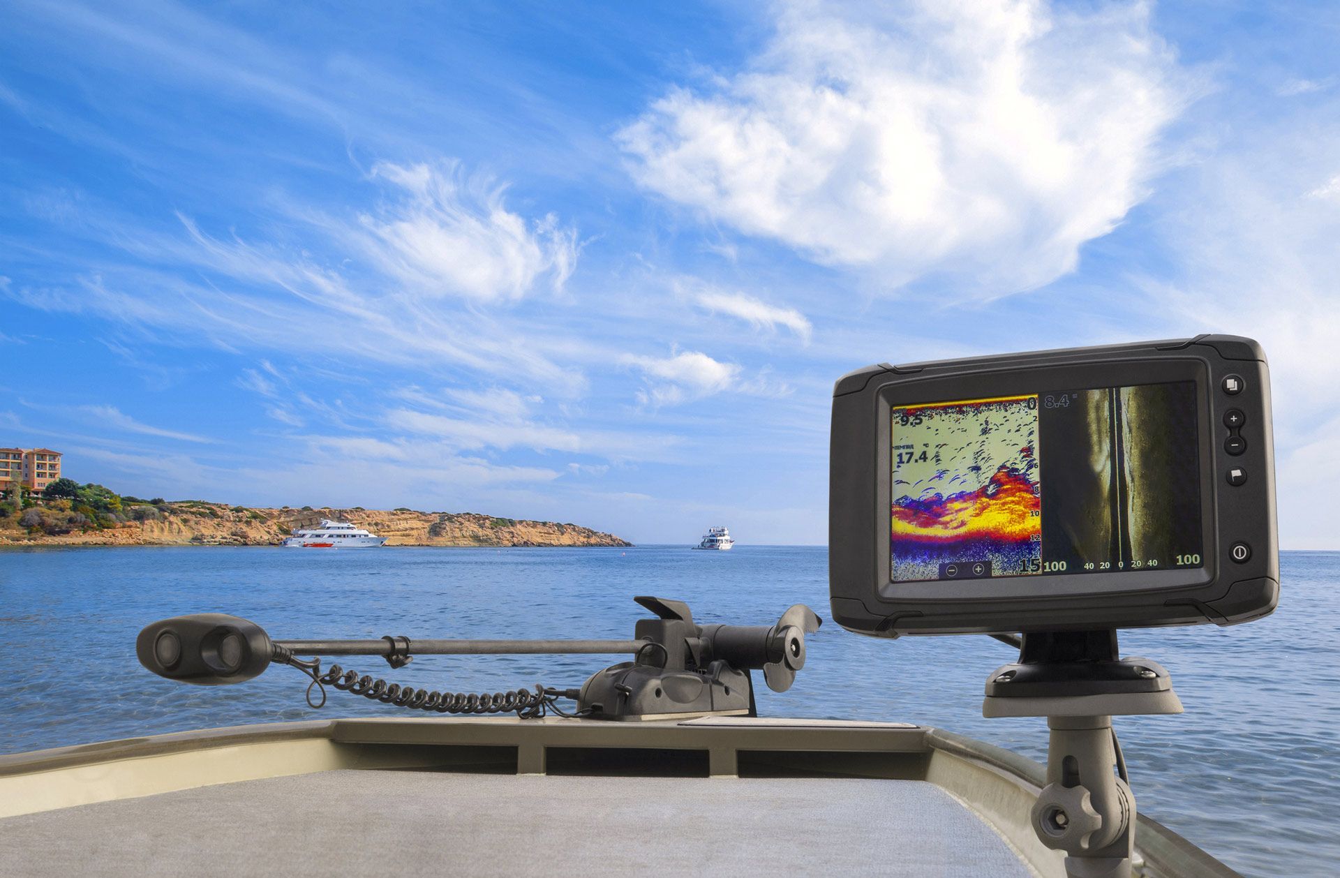 A boat with a fish finder on the side of it.