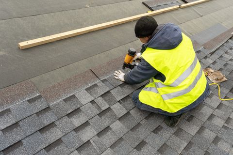 Roofing — Contractor in Blue Helmet in Dinwiddie, VA