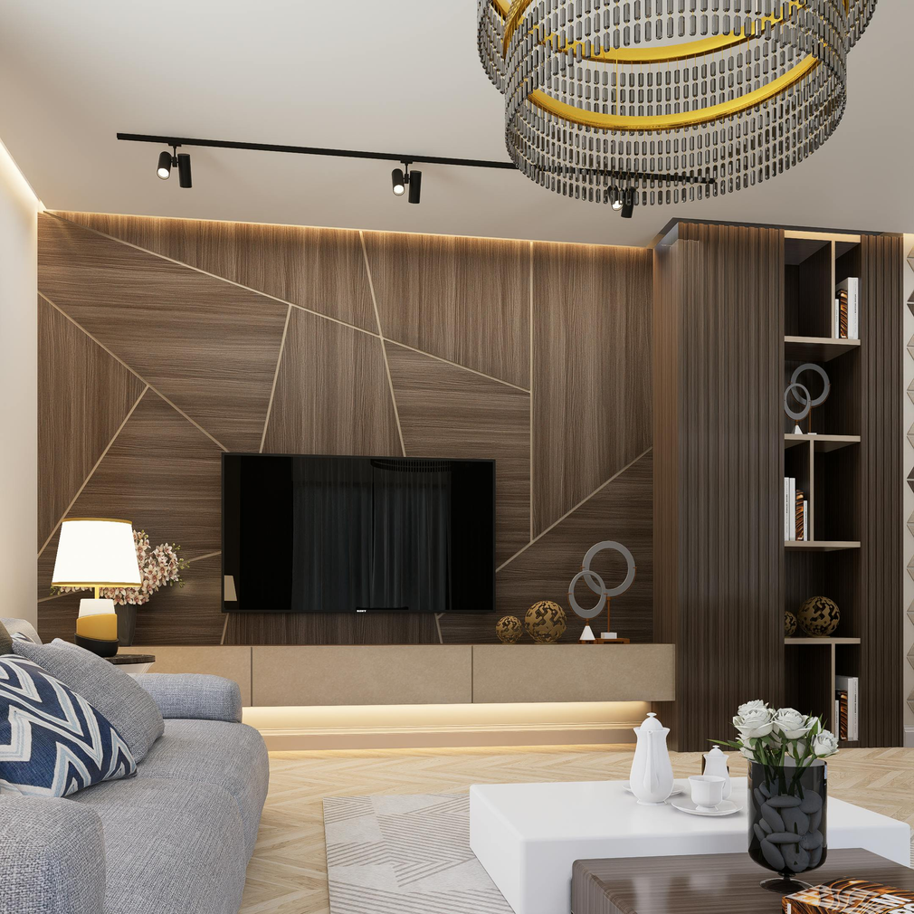 Modern living room with wood TV wall, gray sofa, coffee table, and patterned ceiling light
