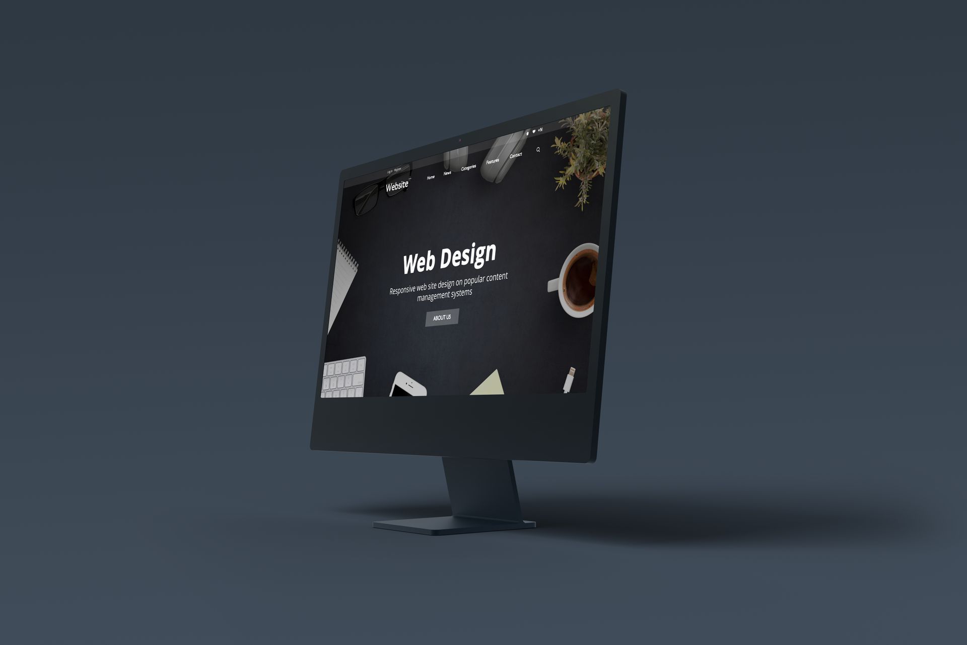A computer monitor with a web design website on it.