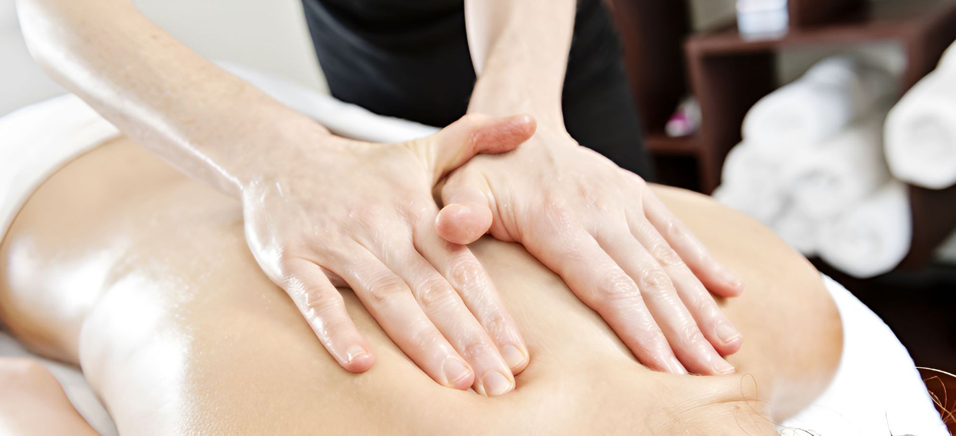 A Woman Is Getting A Massage At A Spa — Essy K Counselling And Wellness Hub In Croudace Bay NSW