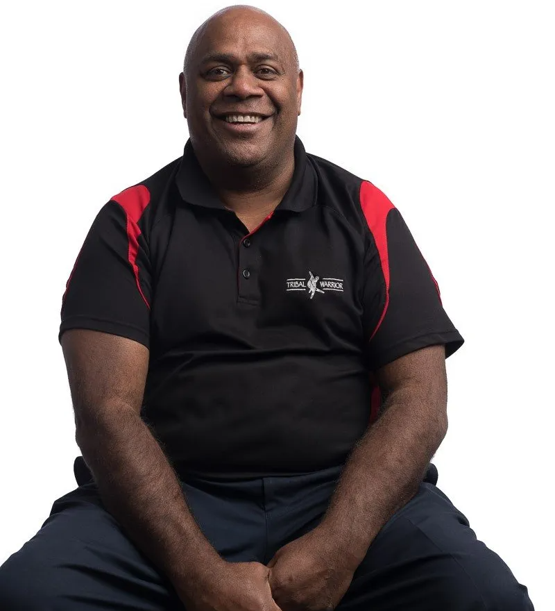 A man wearing a black hoodie with the word cswp on it