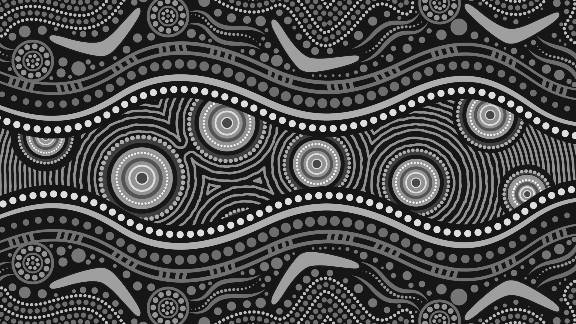 A black and white aboriginal pattern with circles and dots on a black background.