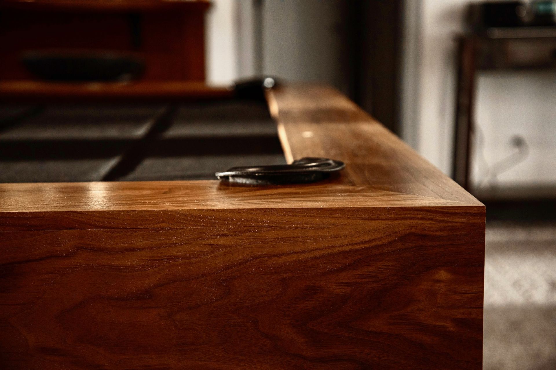 A close up of a wooden table in a living room.