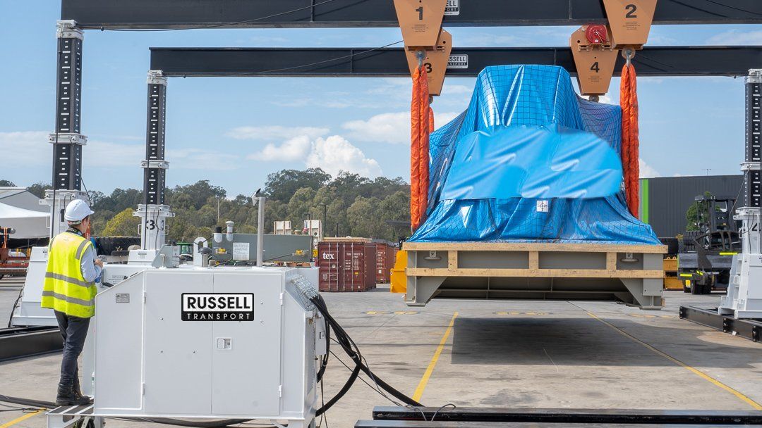 Lifting the Equipment — Eagle Farm, QLD — Russell Transport Pty Ltd