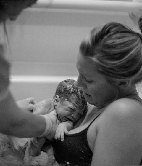 mother and newborn baby in waterbirth