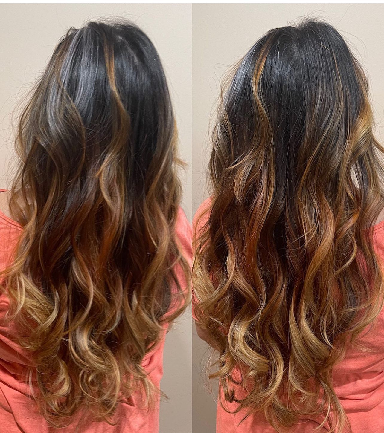 A woman with long wavy hair is wearing an orange shirt.