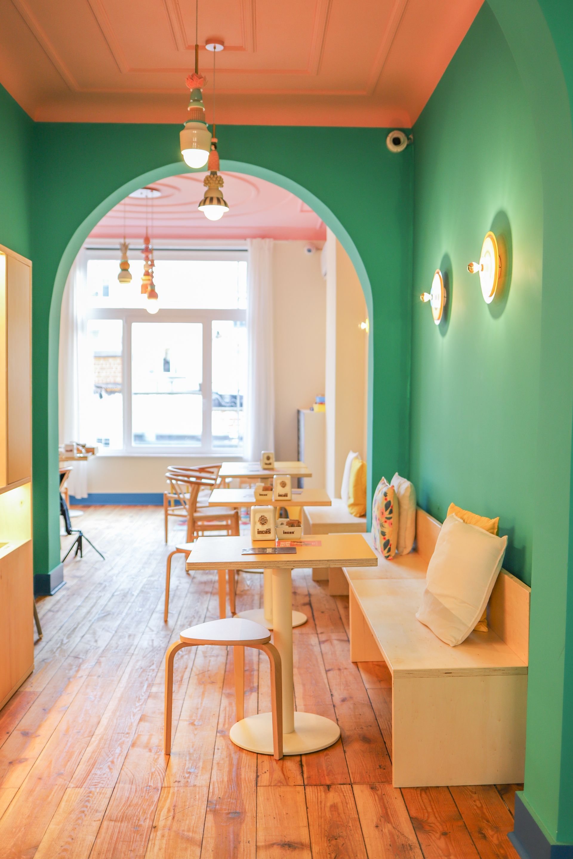 Espresso in white cup, pastry with cherry filling, and sugar packets on a wooden tray.Domenica
Home made italian pastries, food & coffee