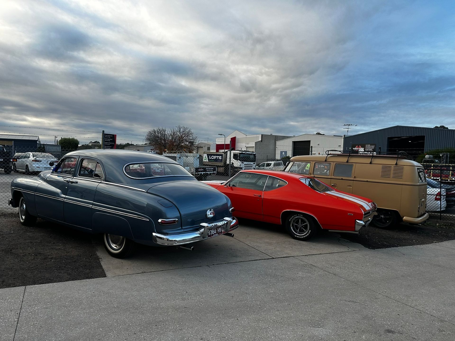Three Retro Cars Parked On The Road Next To Each Other— Marsh Mechanics and Auto Electrical in Maddingley, VIC