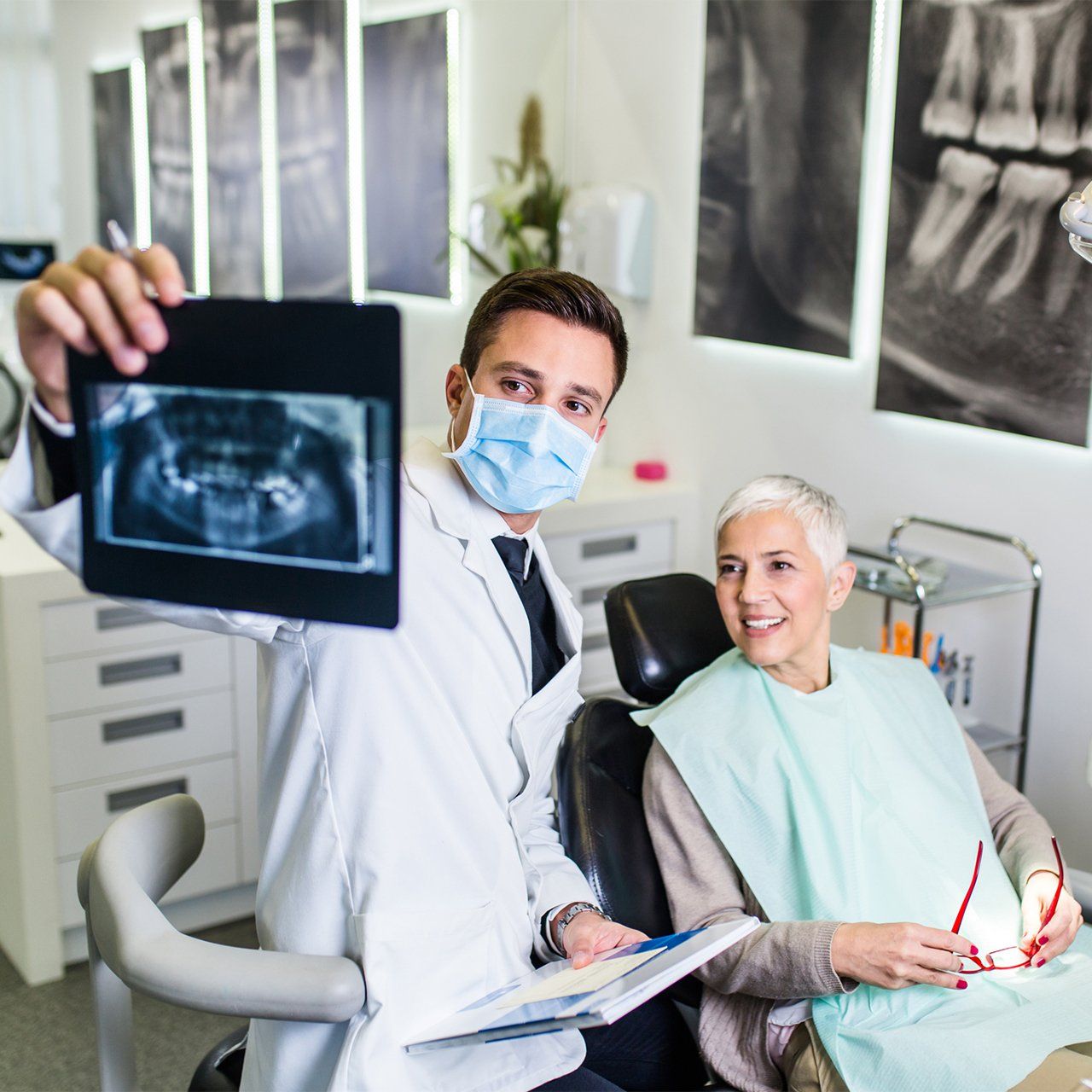 Dentist Showing Teeth X-Ray On His Patient — Frankfort, IL — Brookside Dental Care