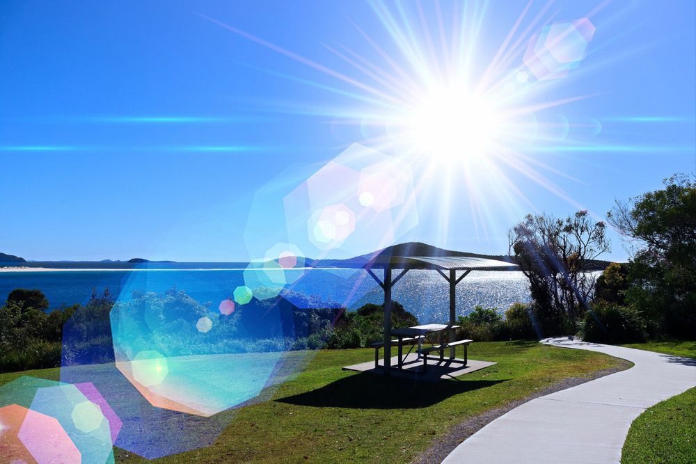 Sun Over The Picnic Table — Water Equipment in Fingal Bay, NSW