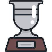 A trophy is sitting on top of a wooden base.