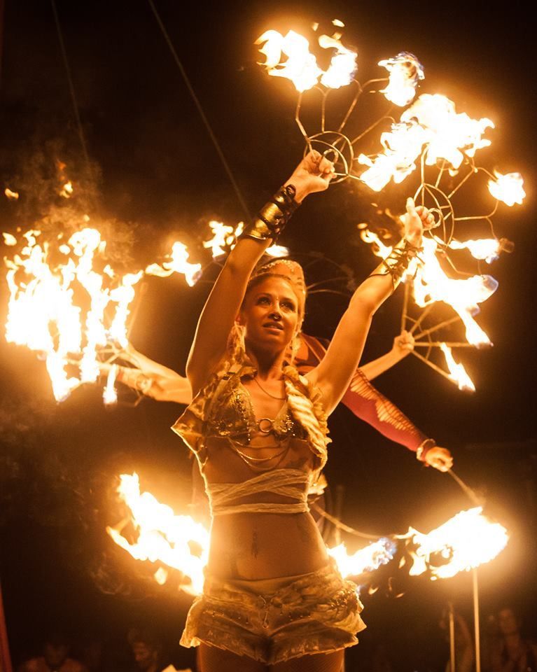 Fire Dancers intertwining as one, twin flames