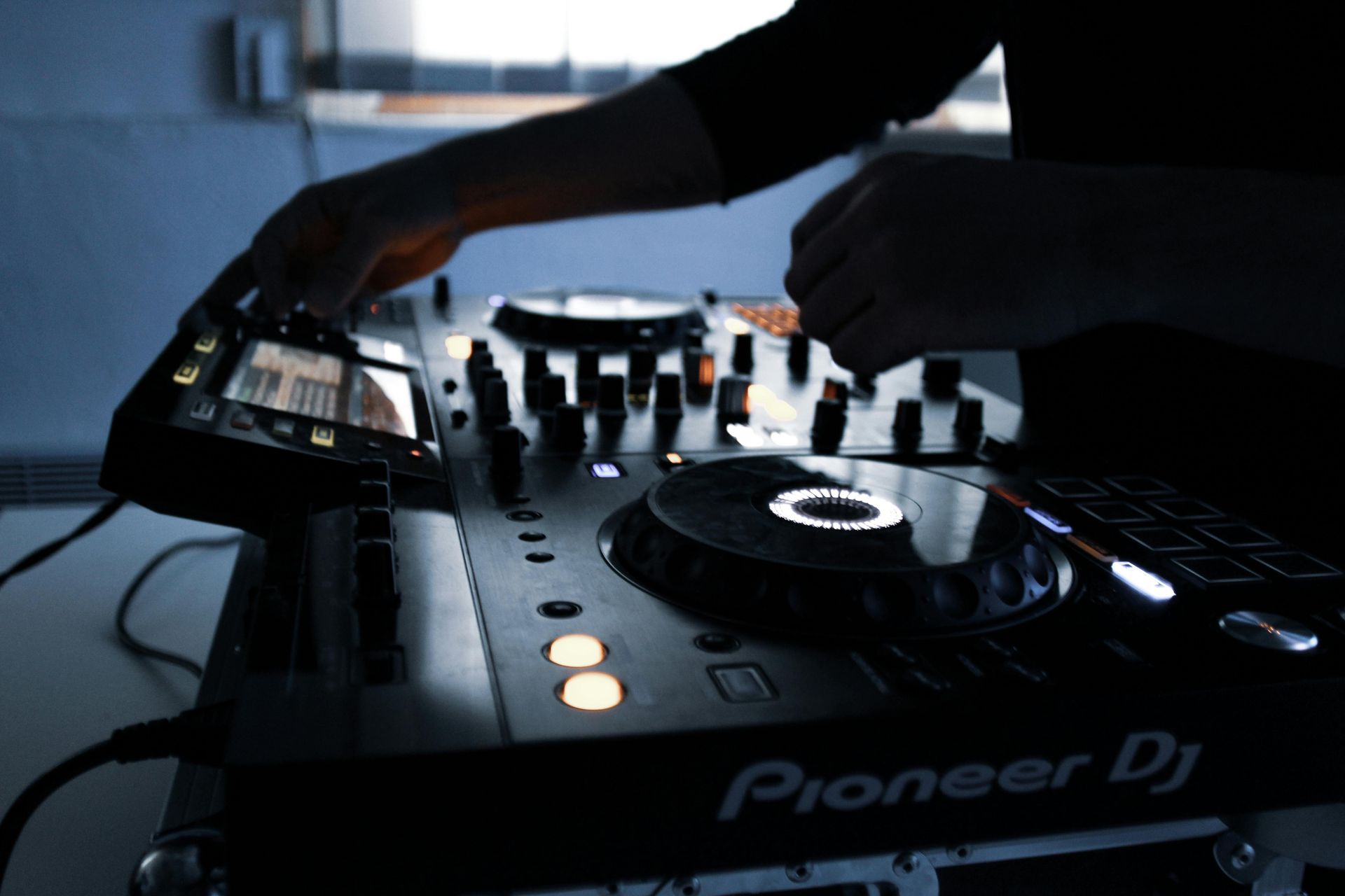 A DJ spinning the decks
