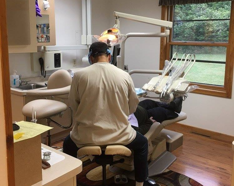 Dentist Holding Dental Crowns — Rhinelander, WI — Timber Drive Dental Inc