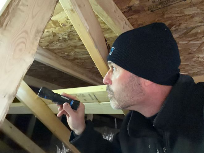 A Man In A Kitchen — Cumberland, RI — Sharpeye Home & Commercial Property Inspections A Man In A Kitchen — Cumberland, RI — Sharpeye Home & Commercial Property Inspections