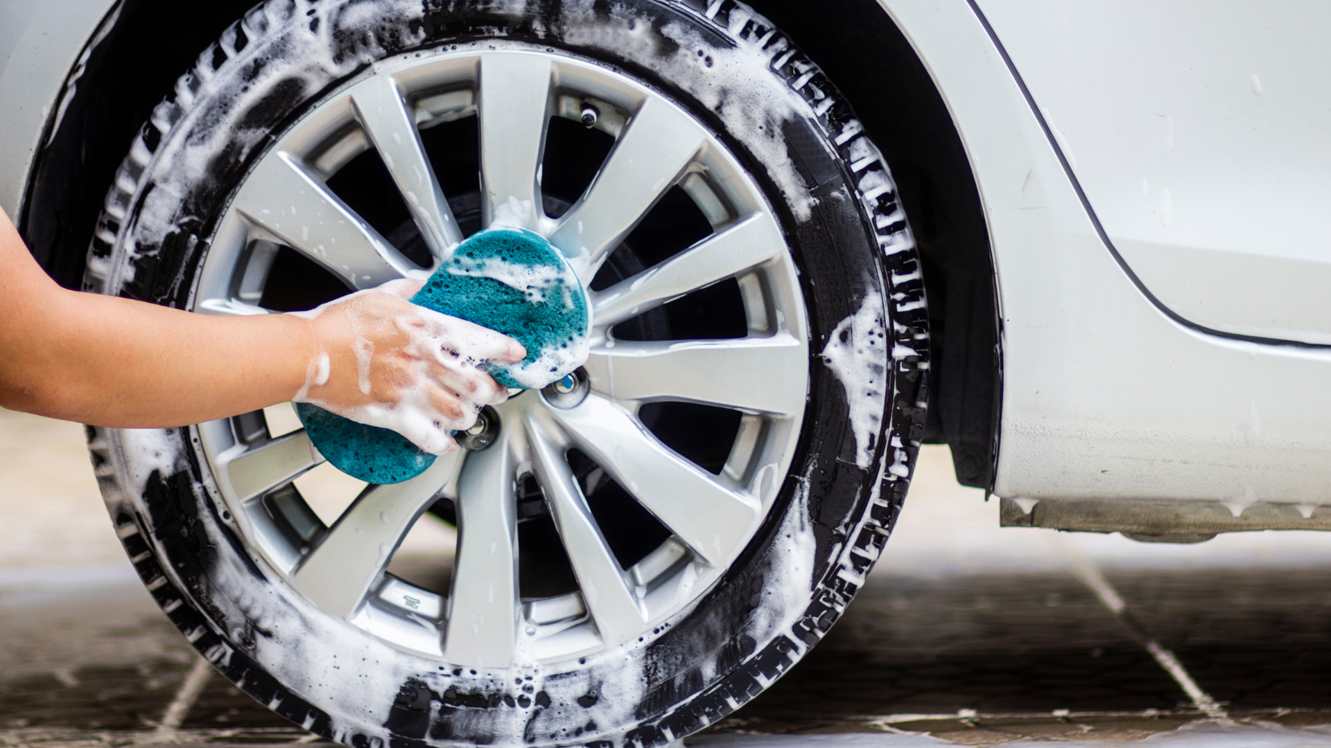 A close up of a car wheel with a brake on it.
