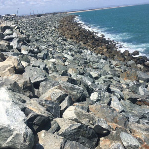 Jagged Rocks On Shoreline — Marine Civil Contractors In Mackay, QLD