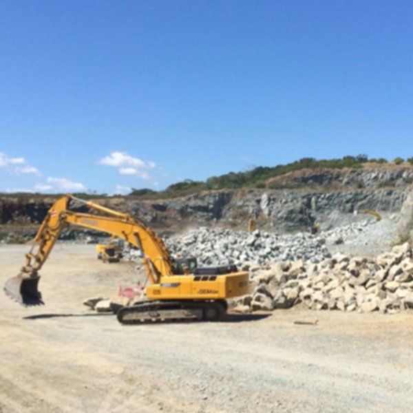 Excavator At Quarry Site — Earthmoving Contractors In Mackay, QLD