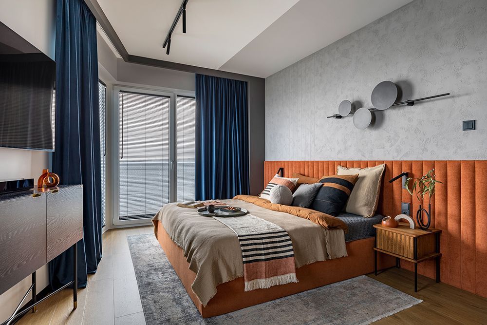 There is a large bed in the middle of the room.