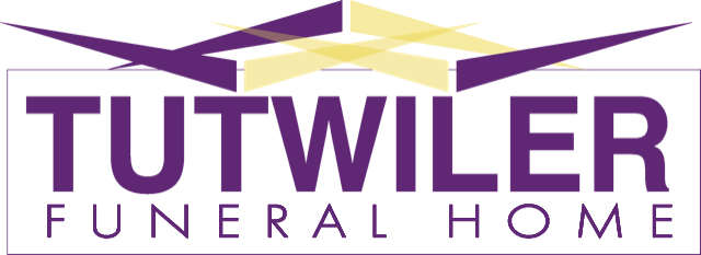 A gold laurel wreath on a white background.