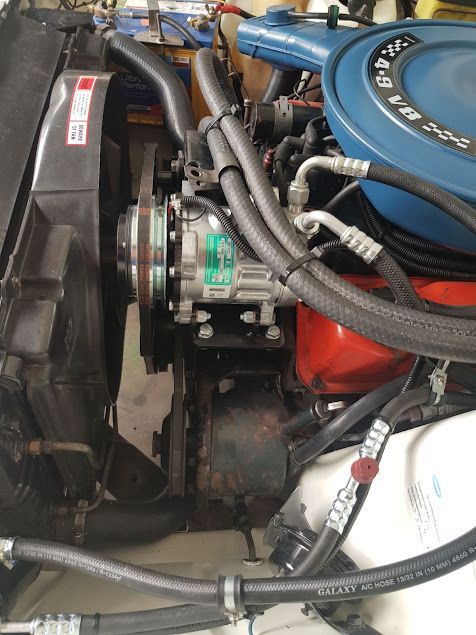 A Close Up Of The Engine Of A Ford Mustang — Airborne Auto Air in Wyong, NSW