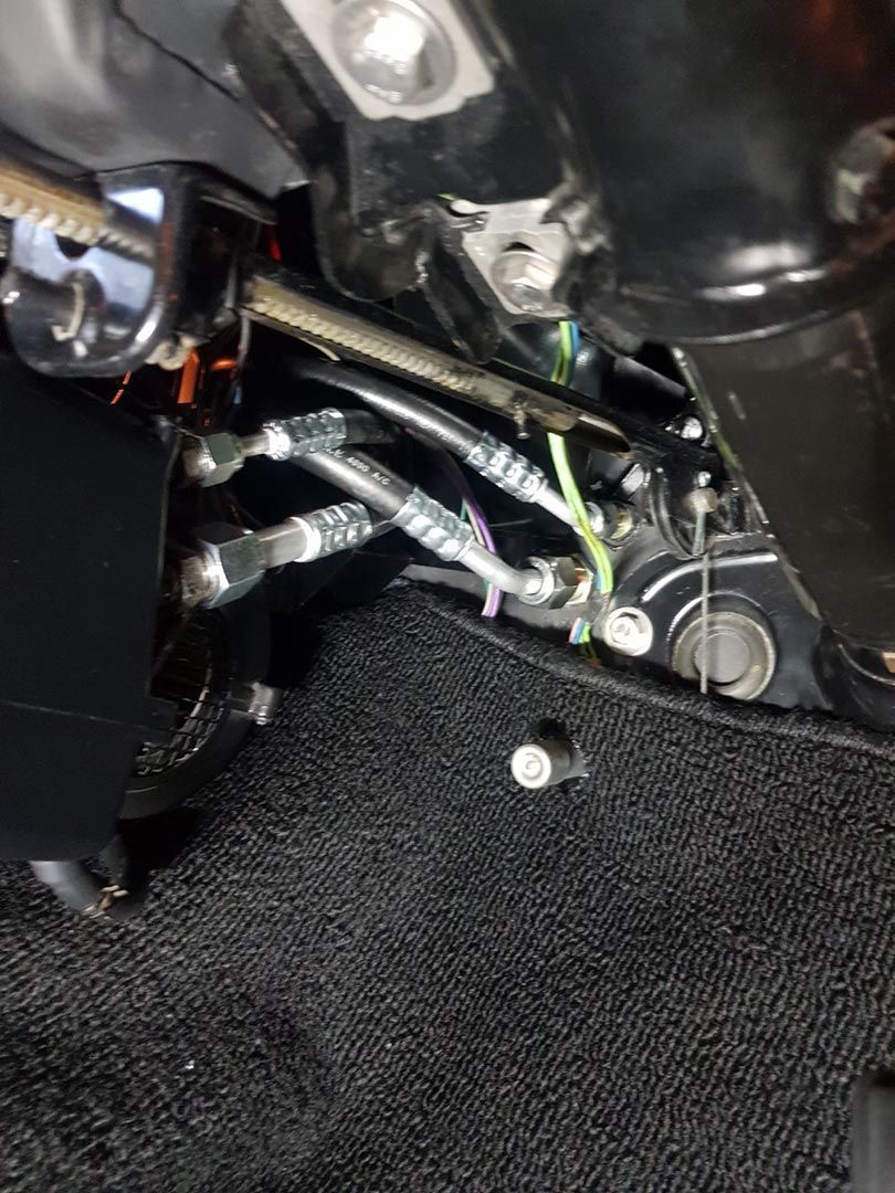 A Close Up Of A Brake Pedal On A Motorcycle — Airborne Auto Air in Gorokan, NSW