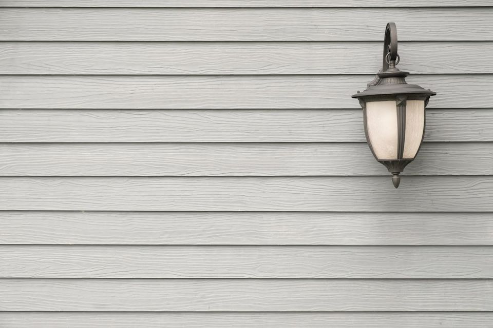 Vintage Antique Classic Wall Lamp on Grey Wood Wall — Columbus, OHUrban Exterior Co.