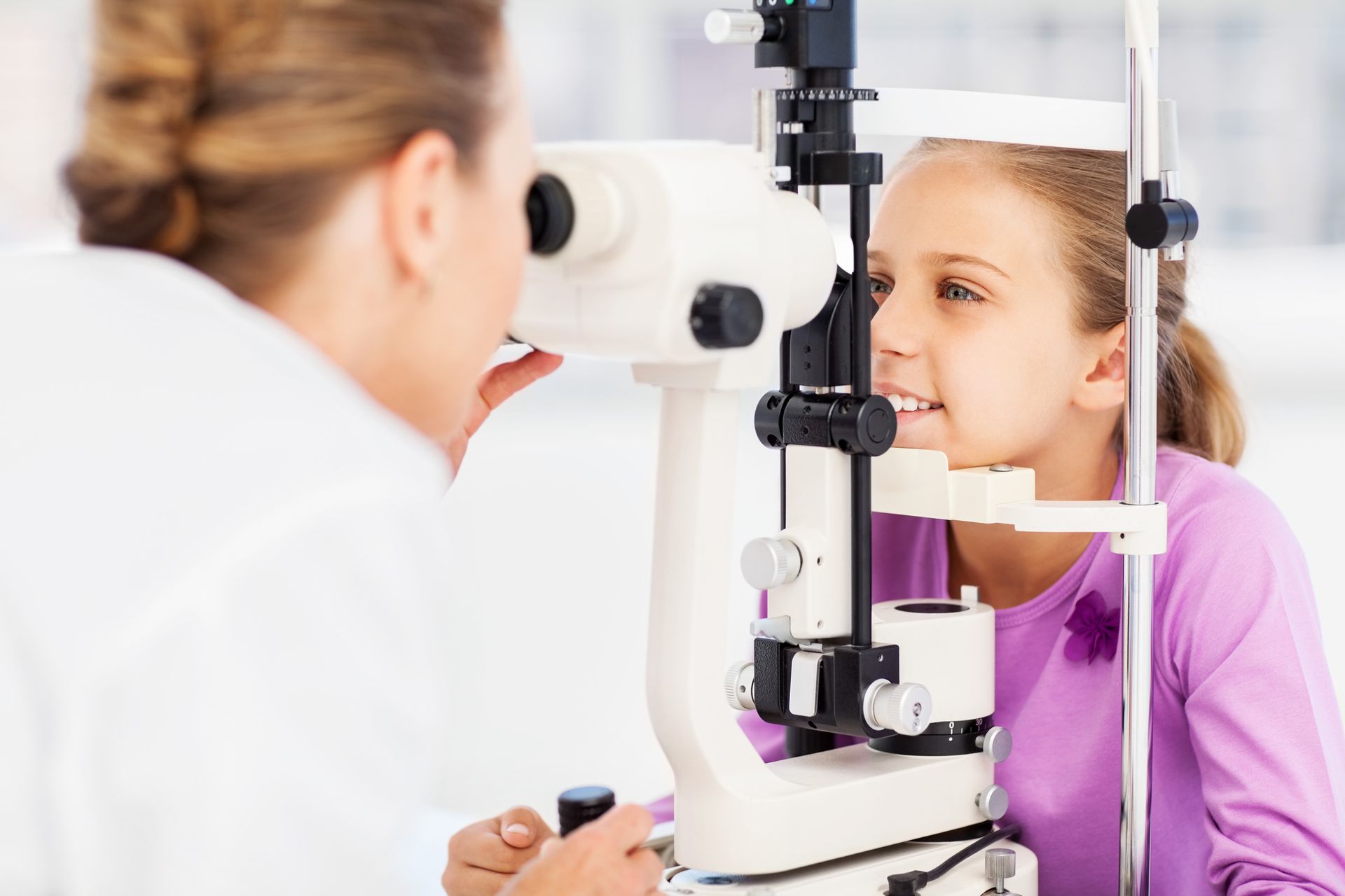 The Girl have the Eye Check-up - Midland, TX - The Eye Institute
