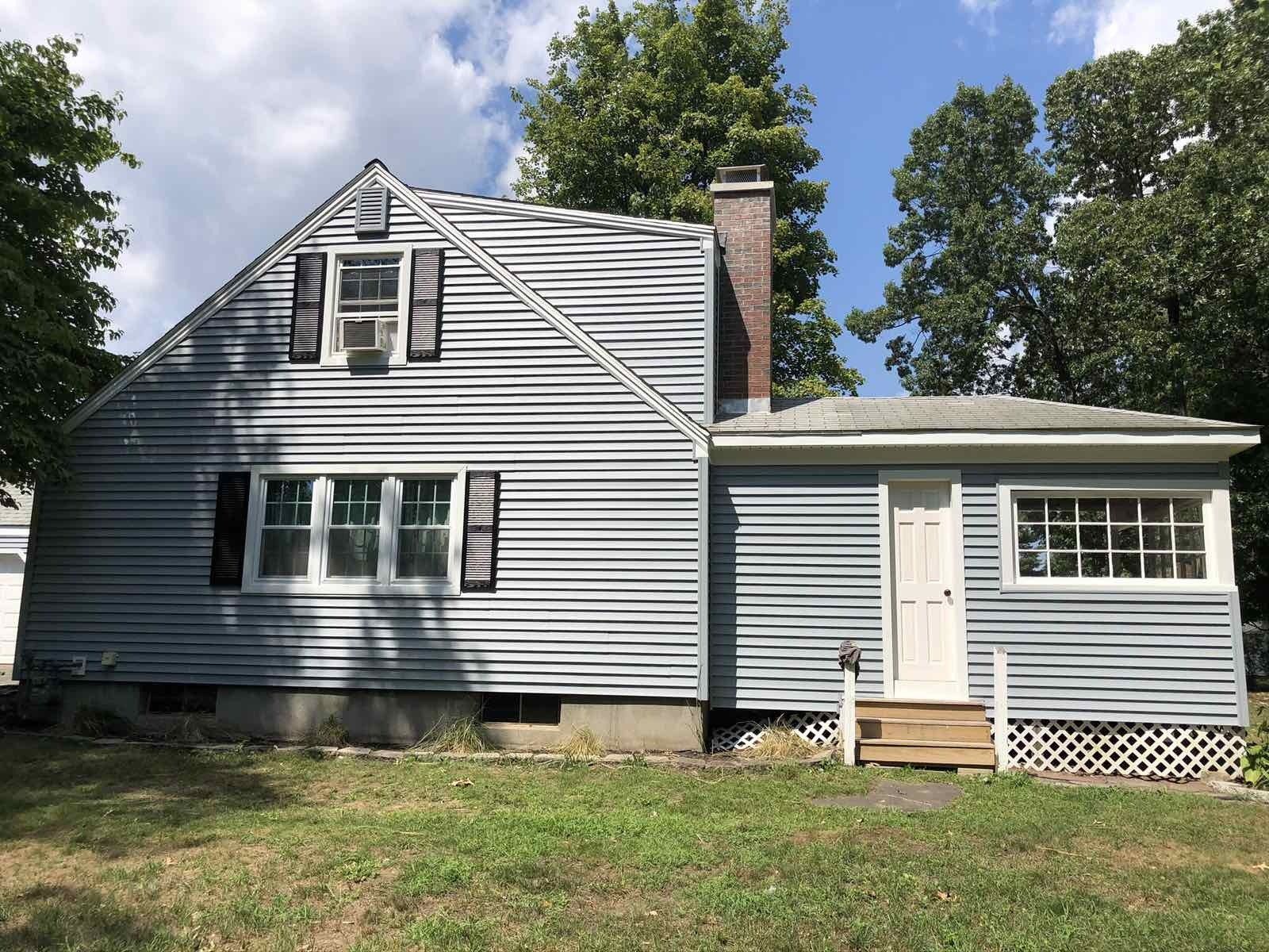 Vinyl siding in baby blue color installed on customers home.