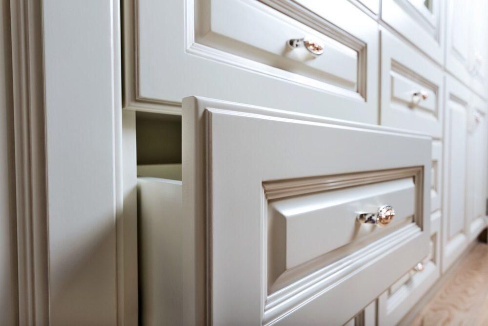 A Close Up of a White Cabinet With a Drawer Open — Port Blinds & Awnings In Coffs Harbour, NSW