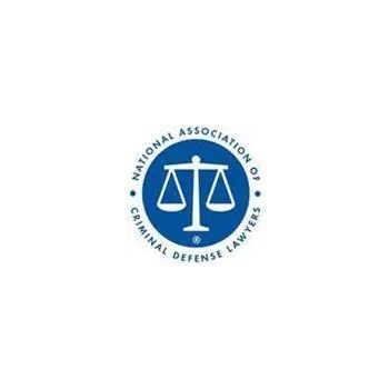 National Association of Criminal Defense Lawyers logo: white scales on a blue circle