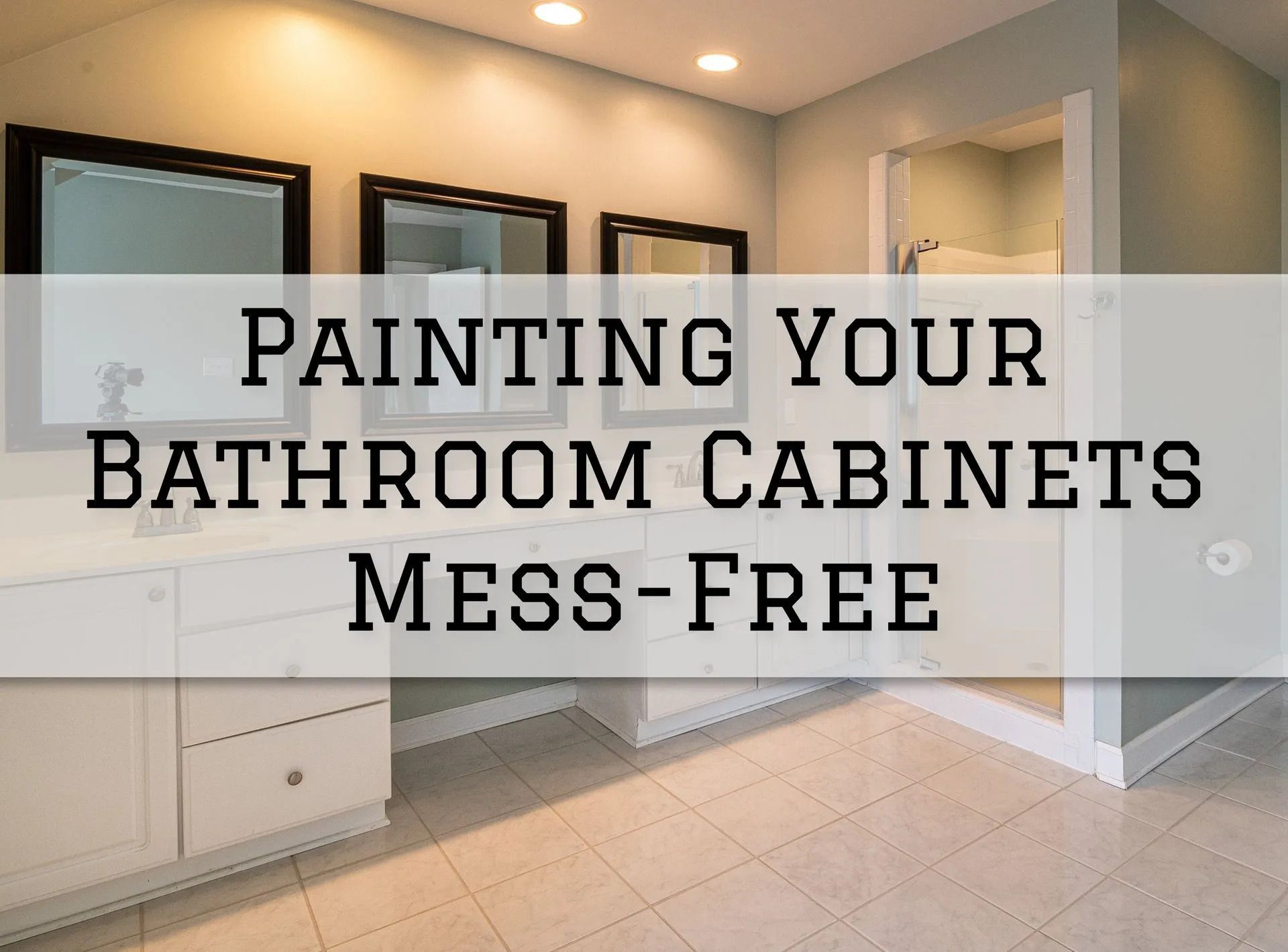 Bathroom with white cabinets, mirrors, and a shower, text: 