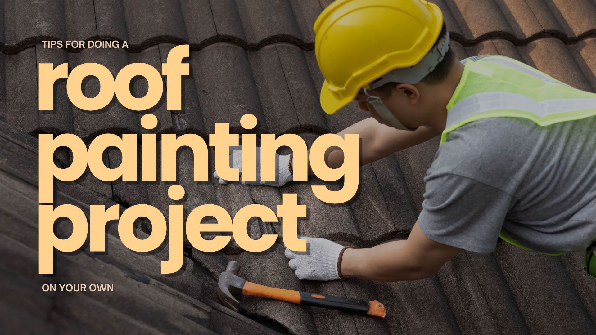 Man in safety gear working on a tiled roof with a hammer. Text reads