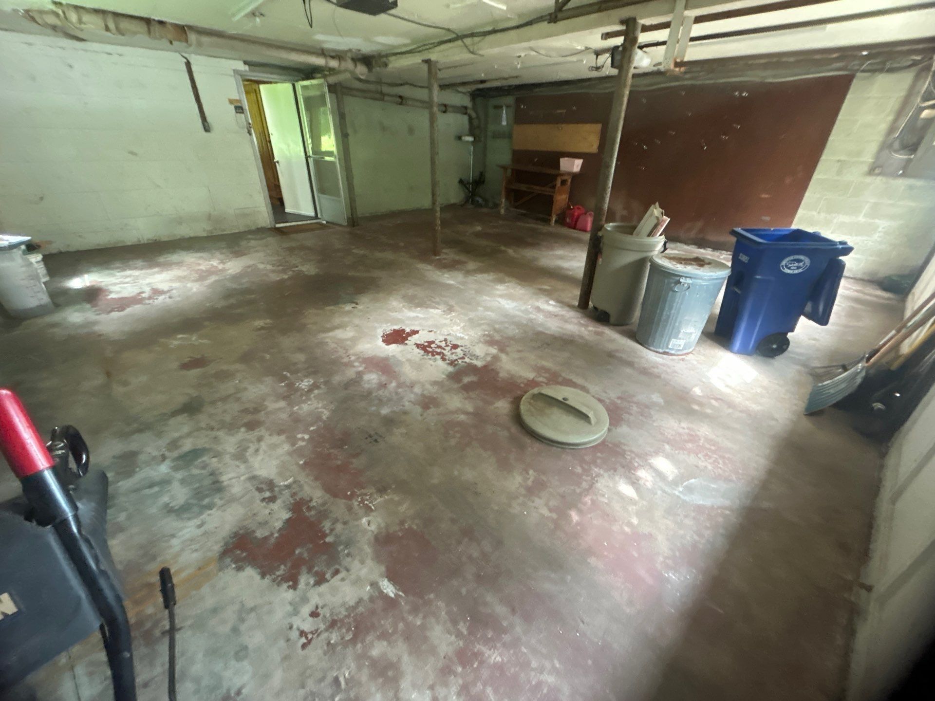 Dirty, unfinished garage.