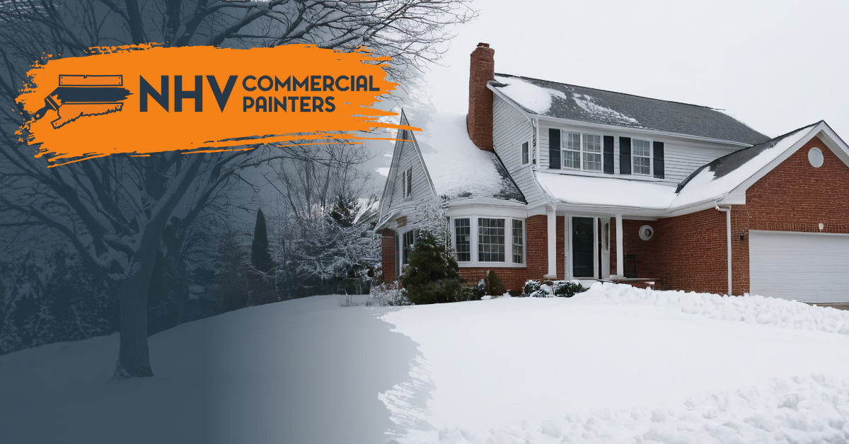 A brick house in a snowy landscape with the orange 