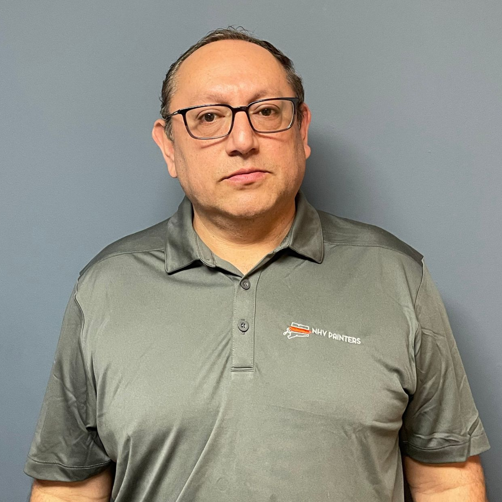 A portrait of NHV Painters Project Manager Jorge Abad