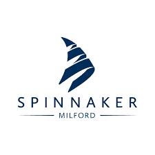 Logo for Spinnaker Milford. Blue abstract design resembles a sail; text