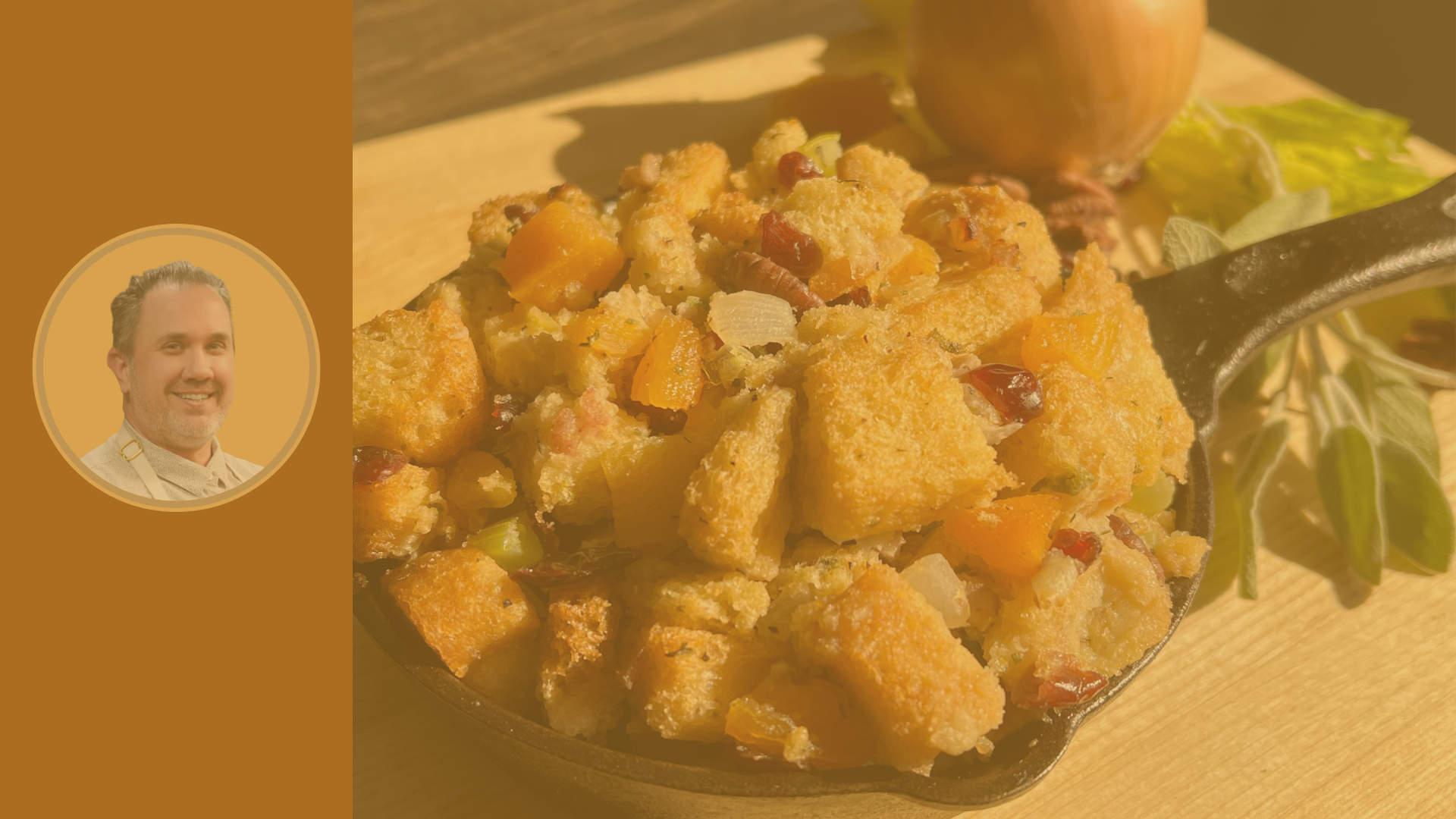 black pan filled with bread stuffing and cranberries