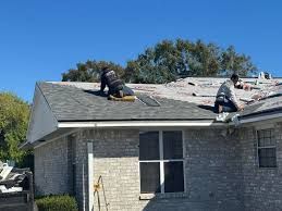 Roofer installing a new roof