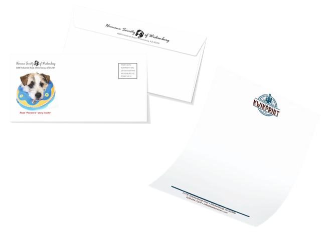 Stationery set: dog on envelope, letterhead with logo, and a blank envelope.