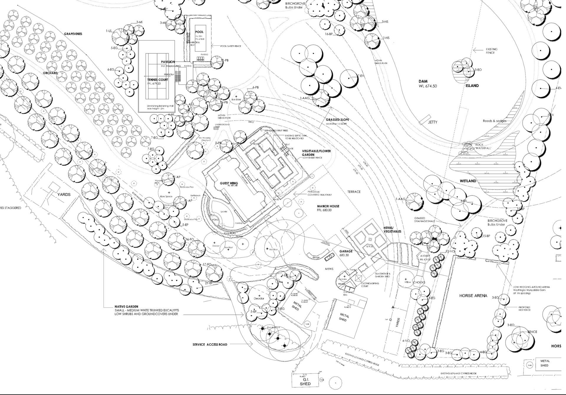 Person laying rolled sod on prepared soil, outdoors; green grass, brown soil, red gloves.