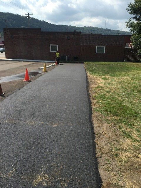 Old Asphalt Road — Harrisburg, NC — Bryer & Son Asphalt Paving