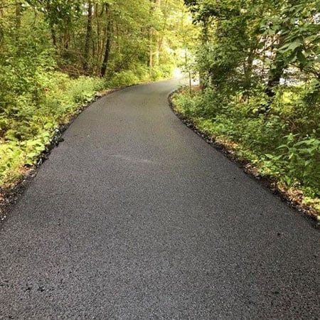 Asphalt Road and Trees — Harrisburg, NC — Bryer & Son Asphalt Paving