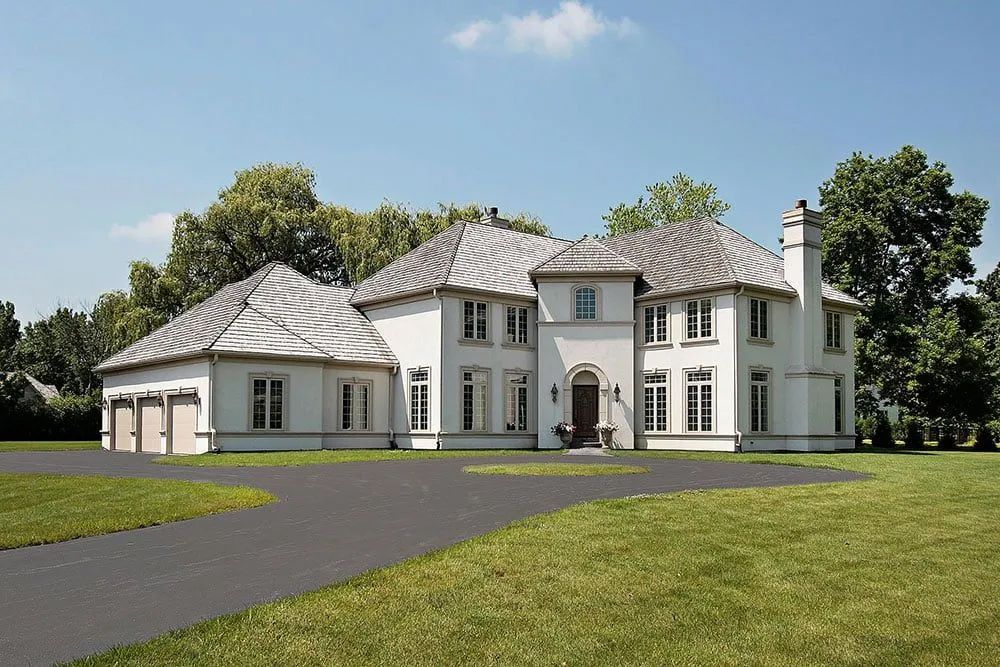 White House with Asphalt Driveway — Harrisburg, NC — Bryer & Son Asphalt Paving