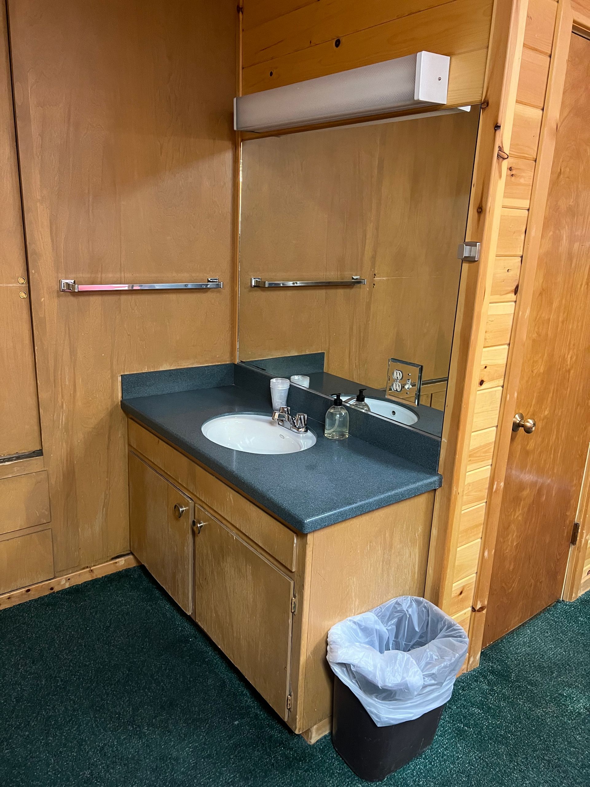 A bathroom under construction with a bathtub and a window.