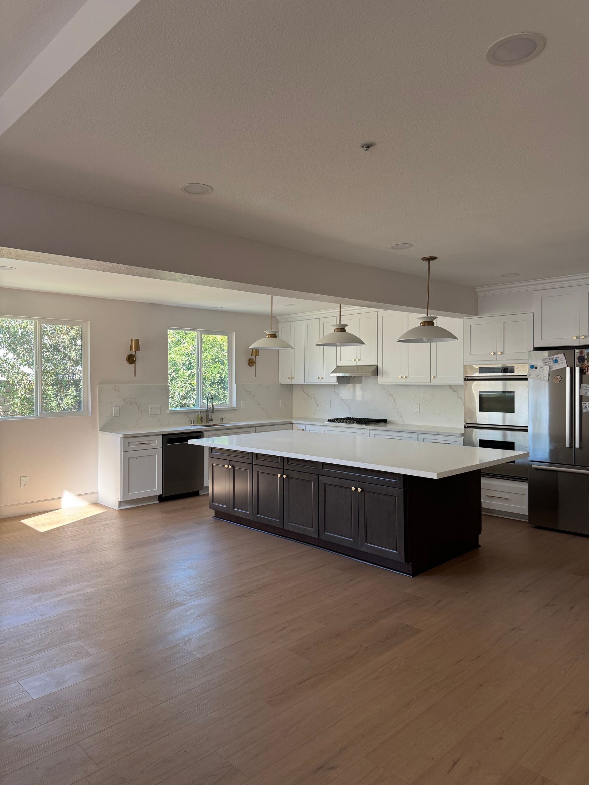 We added 12 feet on to this kitchen. The island in the center is 5ft x 10 ft with tons of seating! The new efficient windows help to keep this kitchen cool during the hottest months!