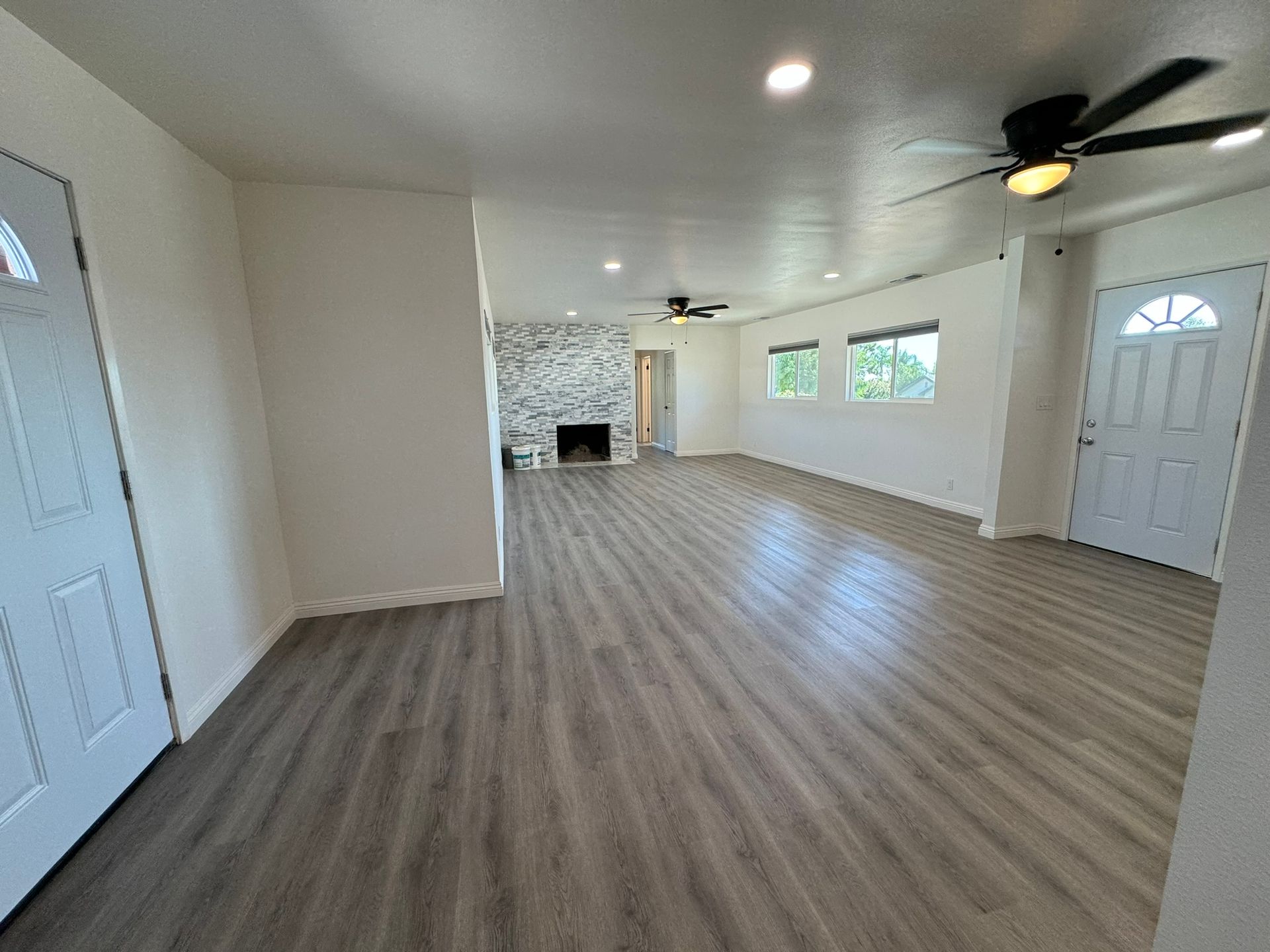 There is a vacuum cleaner in the middle of the room.