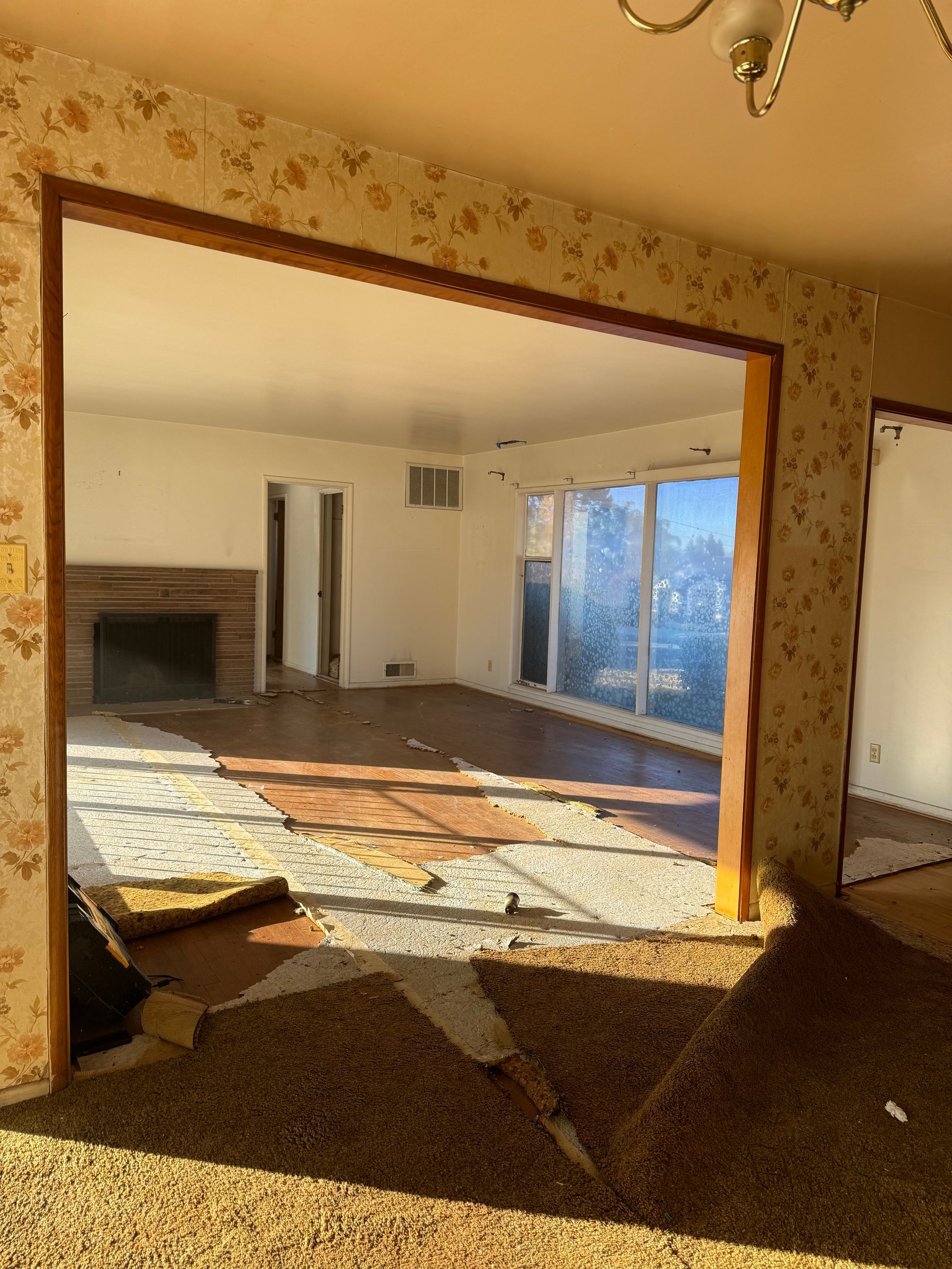 A large Living room with a wall that was just in the way!